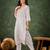Peach color roman silk blend ethnic kurta set for embroidered ceremonial looks