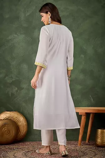 Yellow color roman silk blend kurta set for embroidered ceremonial looks