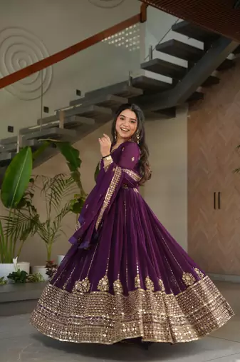 Purple color faux georgette graceful ceremonial wear trendy gown with dupatta