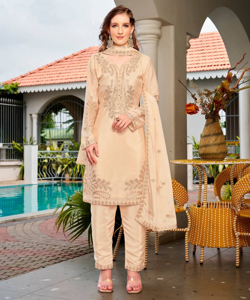 Cream color chinon fabric designer embroidered free size stithed suit