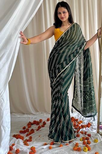 Dark green chiffon saree in leheriya with foil border work