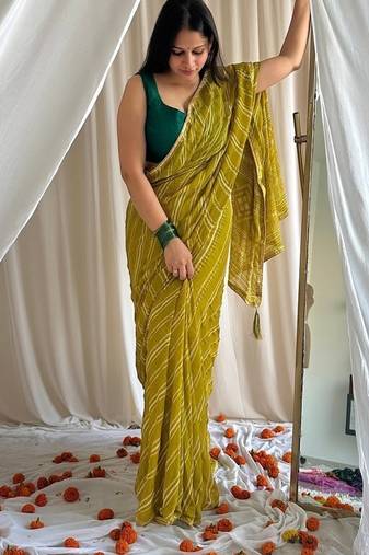 Lemon green chiffon saree in leheriya with foil border work