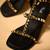 Gold studded black heels with ankle straps
