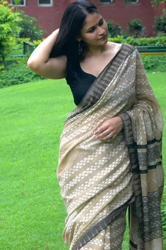 Beige hand block printed linen saree with stripe blouse