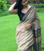 Beige hand block printed linen saree with stripe blouse