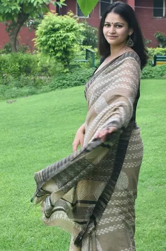 Beige hand block printed linen saree with stripe blouse