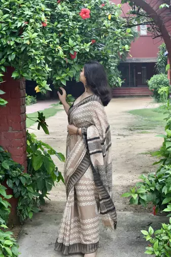 Beige hand block printed linen saree with stripe blouse