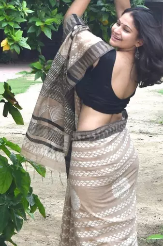 Beige hand block printed linen saree with stripe blouse