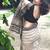 Beige hand block printed linen saree with stripe blouse
