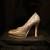 Brocade black and gold pumps