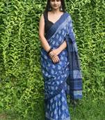 Blue hand block printed linen saree with stripe blouse