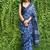 Blue hand block printed linen saree with stripe blouse