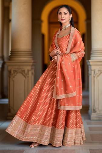 Orange color heavy glamorous ceremonial wear anarkali viscose shimmer dress