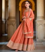Orange color heavy glamorous ceremonial wear anarkali viscose shimmer dress