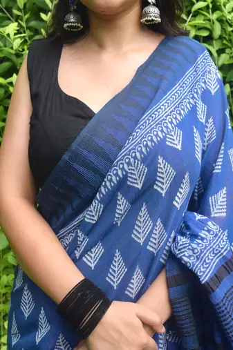 Blue hand block printed linen saree with stripe blouse