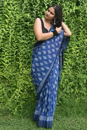 Blue hand block printed linen saree with stripe blouse