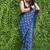 Blue hand block printed linen saree with stripe blouse