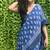 Blue hand block printed linen saree with stripe blouse