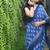 Blue hand block printed linen saree with stripe blouse