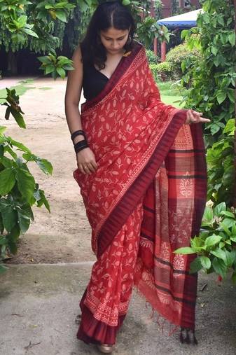 Red hand block printed linen saree with stripe blouse