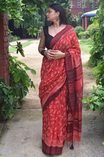 Red hand block printed linen saree with stripe blouse