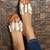 Orange soft tie-up flats.