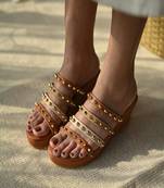 Strappy studded wedges.
