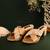 Gold criss cross strap block heels with schell and pearl handwork