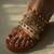 Strappy studded wedges.