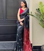 Black ikkat handwoven cotton saree wth handmade tassels
