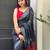 Black ikkat handwoven cotton saree wth handmade tassels