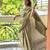 Green hand block printed mul cotton saree with printed blouse