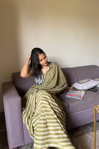 Green hand block printed mul cotton saree with printed blouse