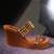 Tan studded wedges