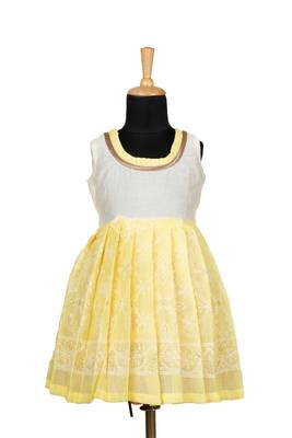 Yellow kota creeper pattu pavadai frocks for girls 1