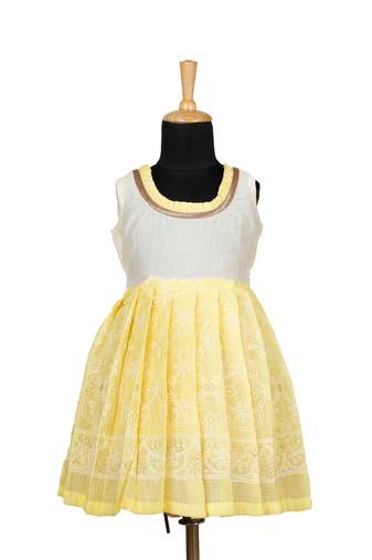 Yellow kota creeper pattu pavadai frocks for girls