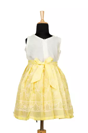 Yellow kota creeper pattu pavadai frocks for girls
