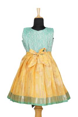 Girls yellow golden grass pattu pavadai frocks 1