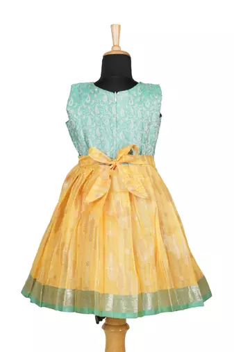Girls yellow golden grass pattu pavadai frocks