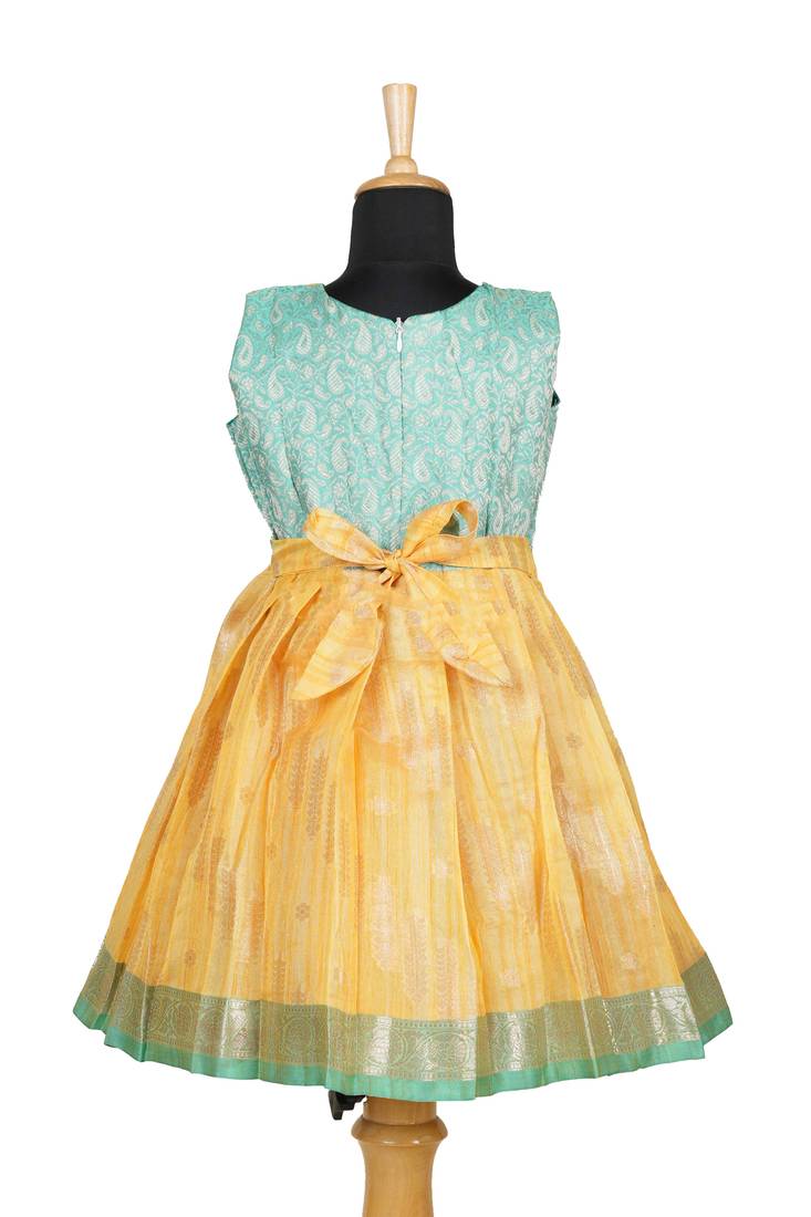 Girls yellow golden grass pattu pavadai frocks