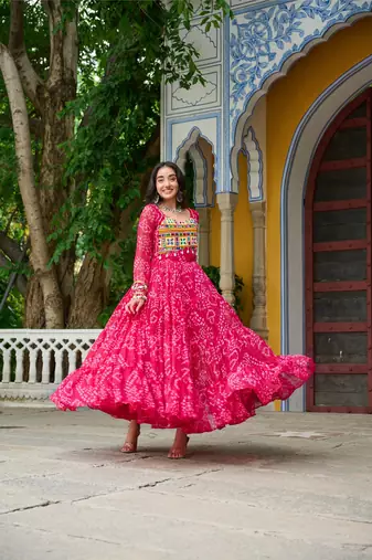 Pink faux georgette badhni print with kutchi patche work navratri gown