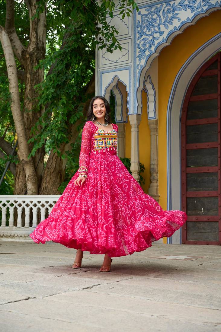 Pink faux georgette badhni print with kutchi patche work navratri gown