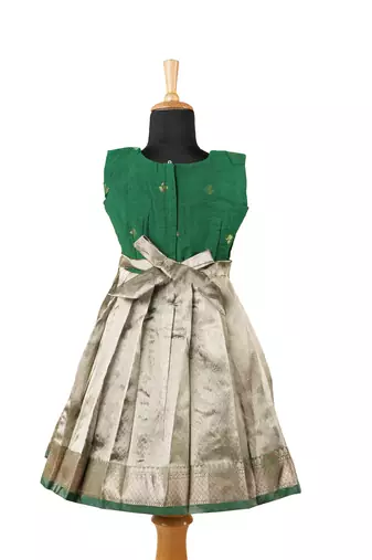 Girls dark green lightening tissue pattu pavadai frocks