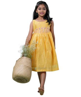Yellow checks rice corn pattu pavadai frocks for kids 1