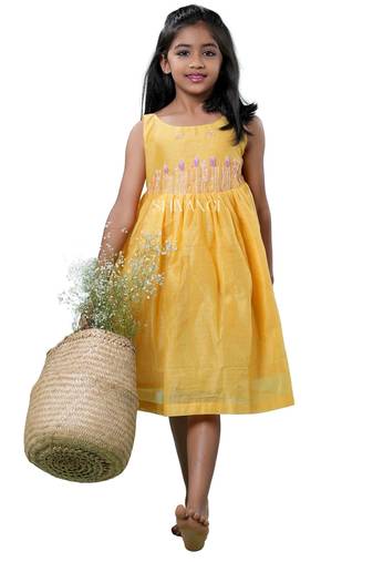 Yellow checks rice corn pattu pavadai frocks for kids