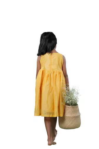 Yellow checks rice corn pattu pavadai frocks for kids