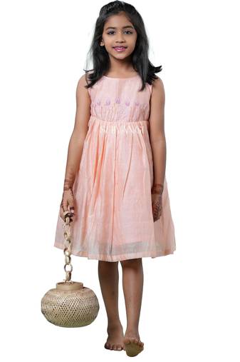 Peach checks rice corn pattu pavadai frocks for kids
