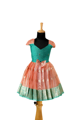 Girls peach floating mango butta pattu pavadai frocks 1