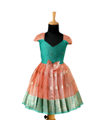 Girls peach floating mango butta pattu pavadai frocks