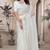 White sequin embroidered net saree with unstitch blouse